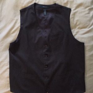 Grey vest with adjustable strap.  Size large